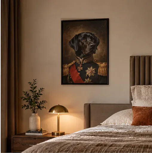 Royal black dog portrait in a dark frame in a warmly styled bedroom